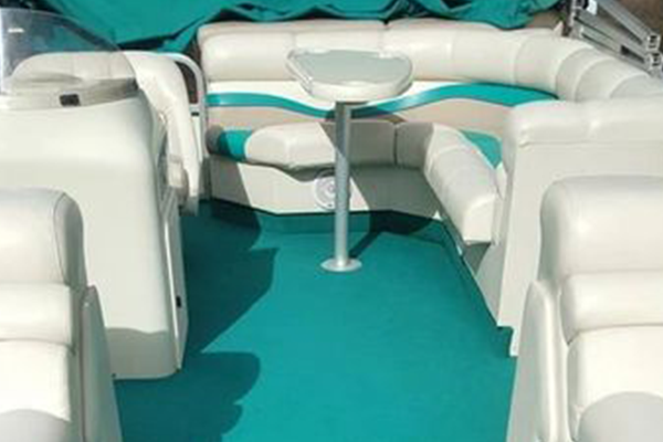 White seats with teal highlights