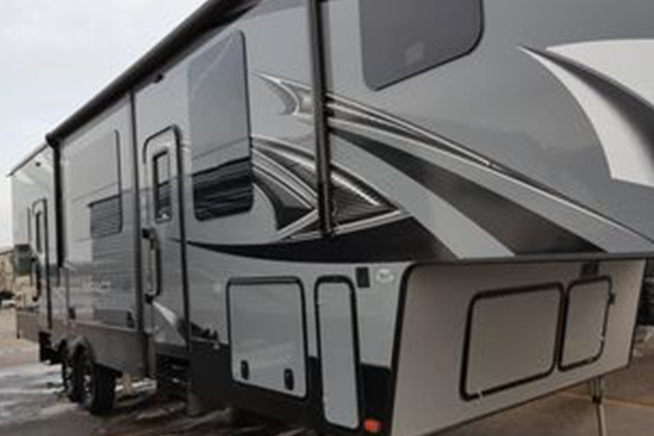 A black and gray RV trailer