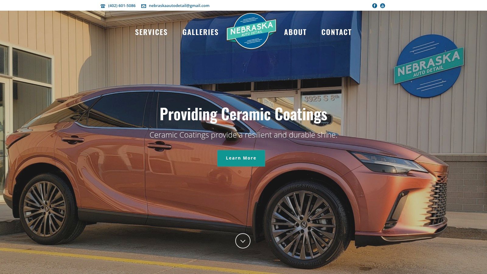 A professional detailer applying a ceramic coating to the hood of a luxury sports car.